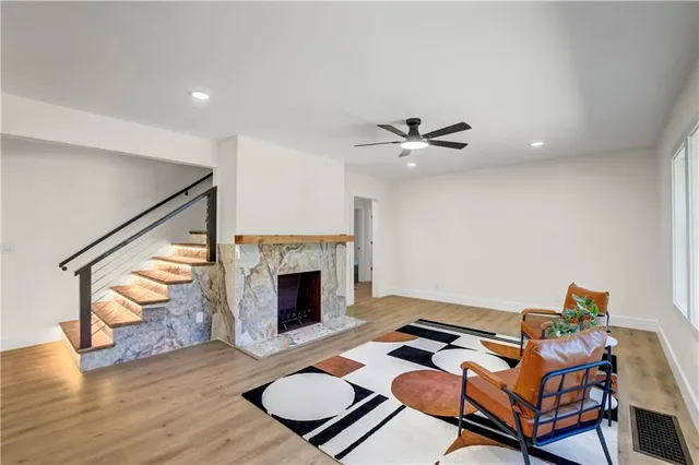 a work room with furniture and a fireplace