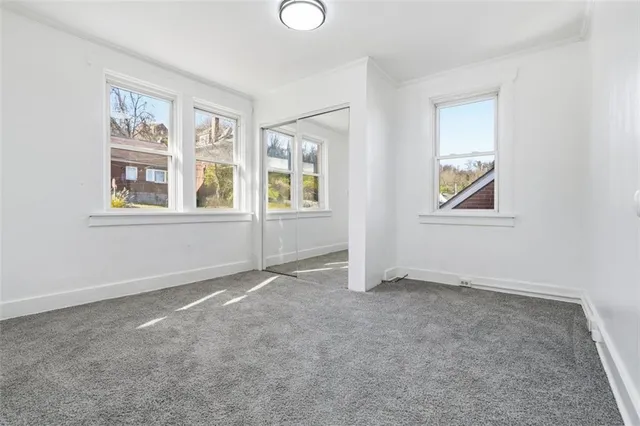 an empty room with windows