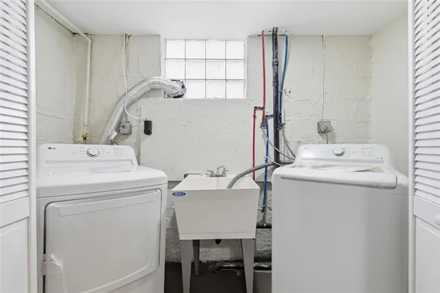 a utility room with dryer and washer
