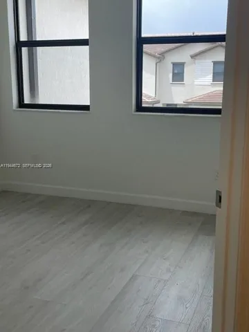 a view of a small space with a window