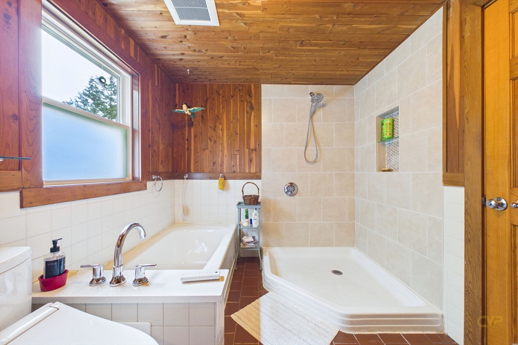70 Neponset Street Canton, MA 02021 - Photo 30 of 39 a bathroom with a tub sink and mirror
