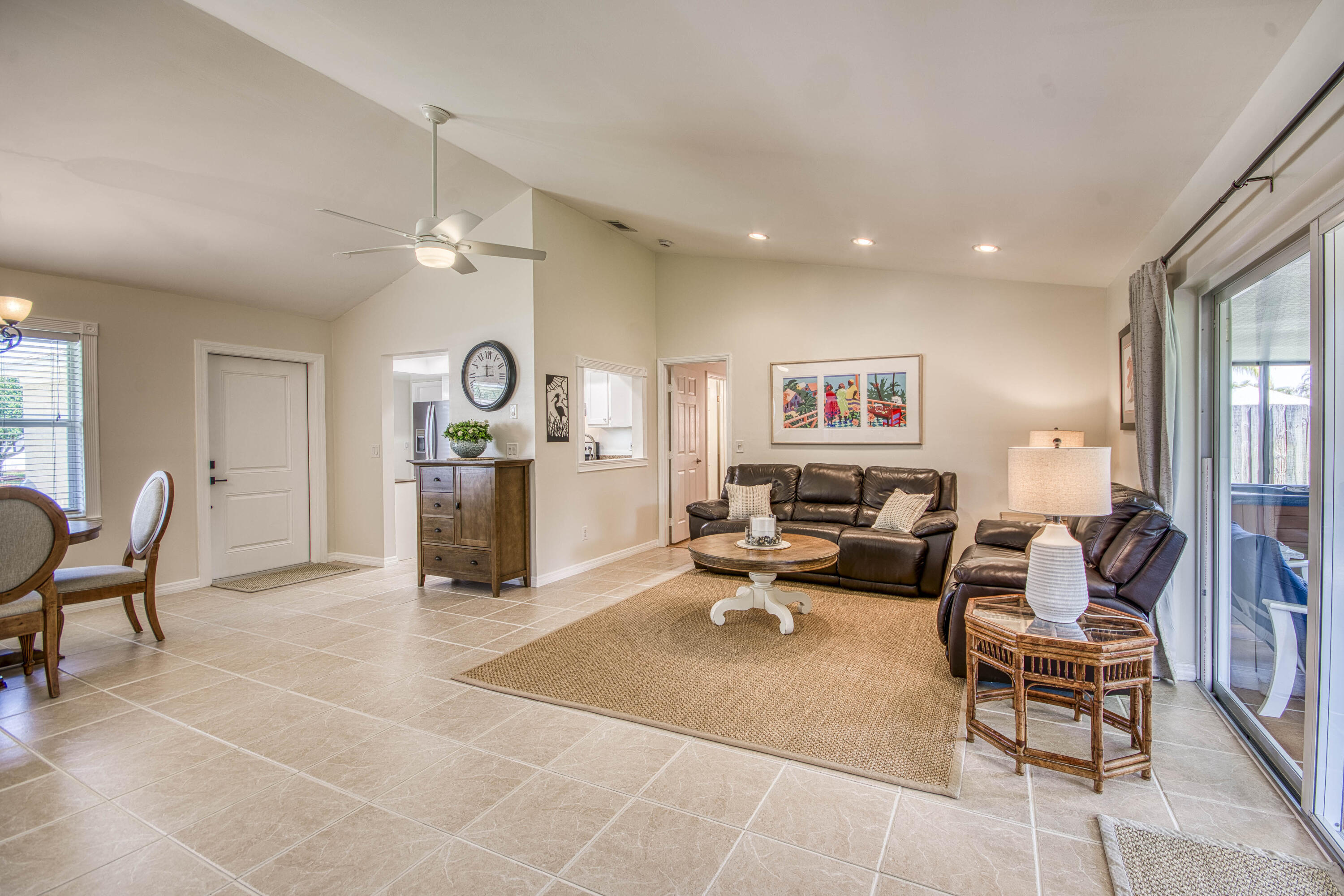108 Wandering Trail Jupiter, FL 33458 - Photo 4 of 34 a living room with furniture
