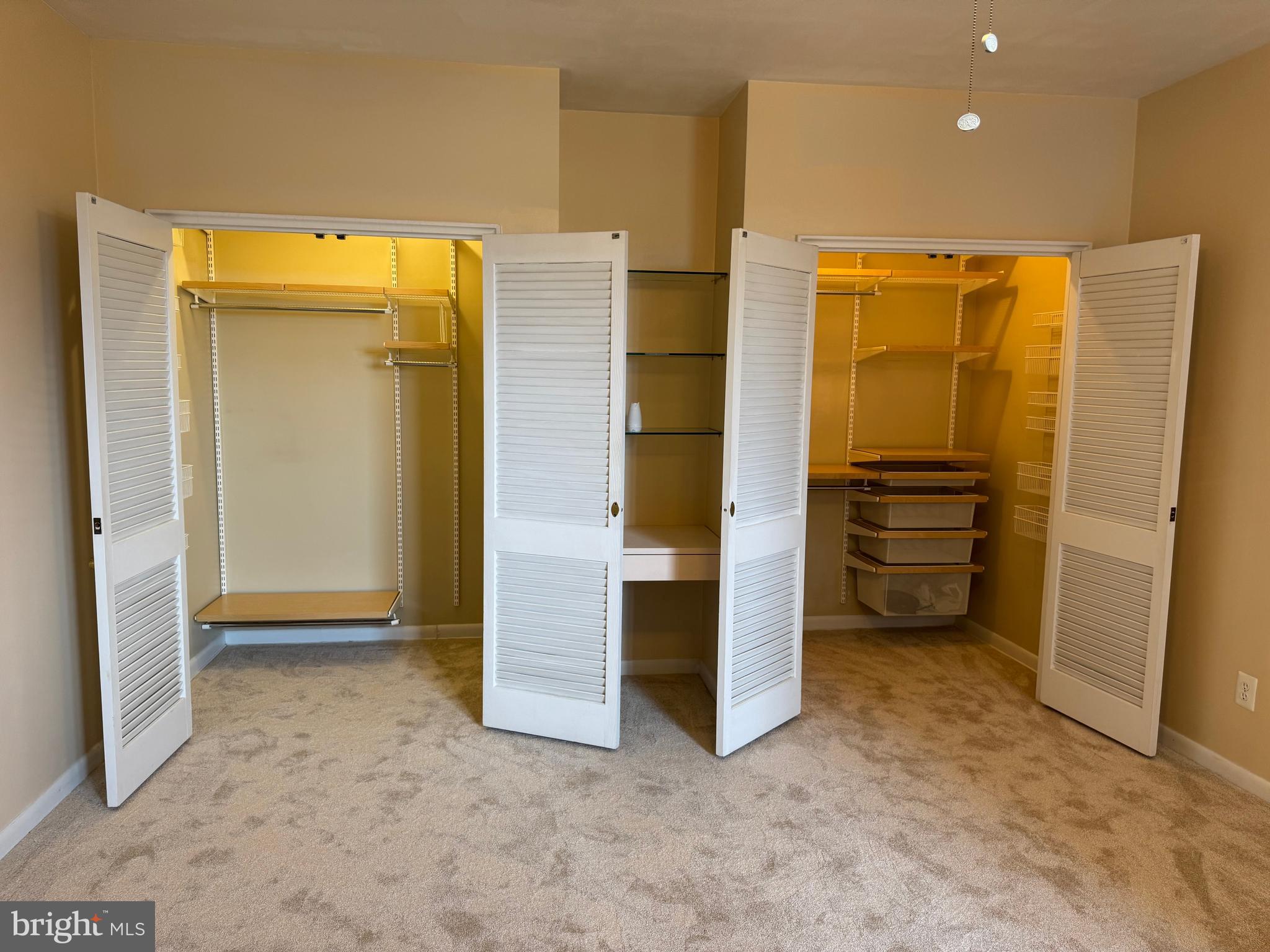 11 Slade Avenue, Unit 715 Baltimore, MD 21208 - Photo 13 of 48 an empty room with closet and a bathroom