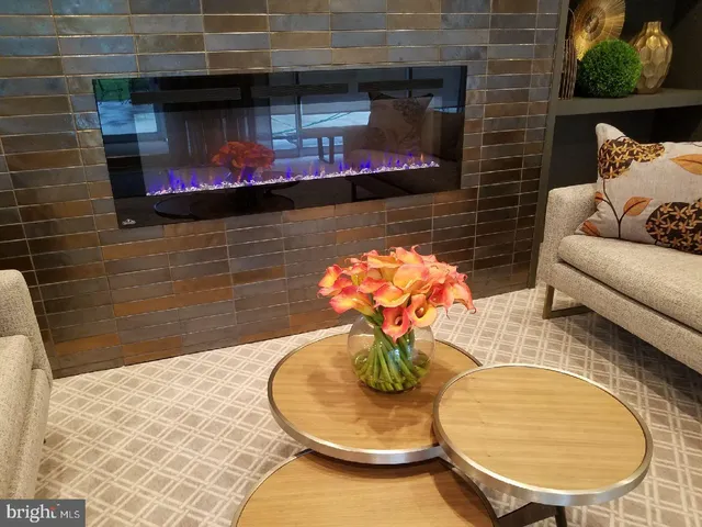 a view of a dining room with furniture and window