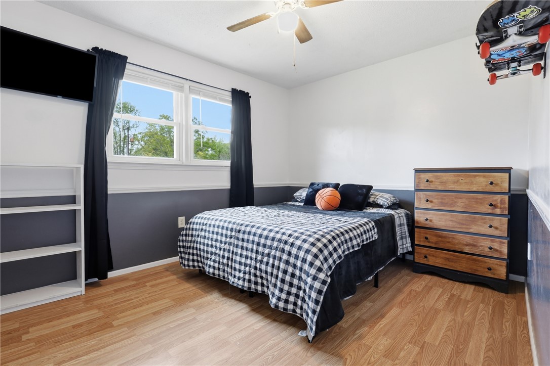 904 New Prospect Church Road Anderson, SC 29625 - Photo 18 of 31 This cozy bedroom features durable flooring and ample natural light, creating a comfortable and inviting space.