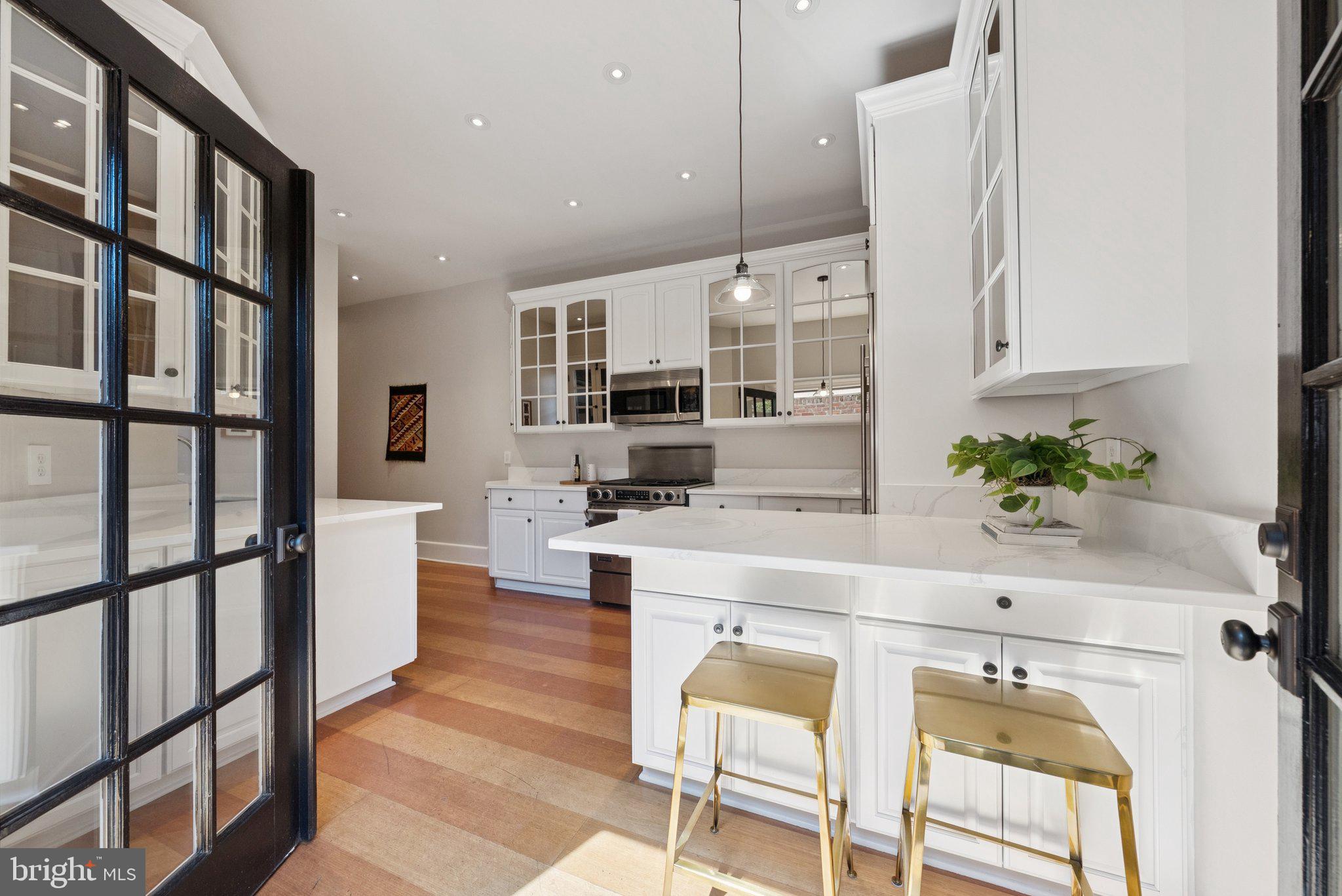 1849 Calvert Street Northwest Washington, DC 20009 - Photo 13 of 45 Breakfast bar and patio access.