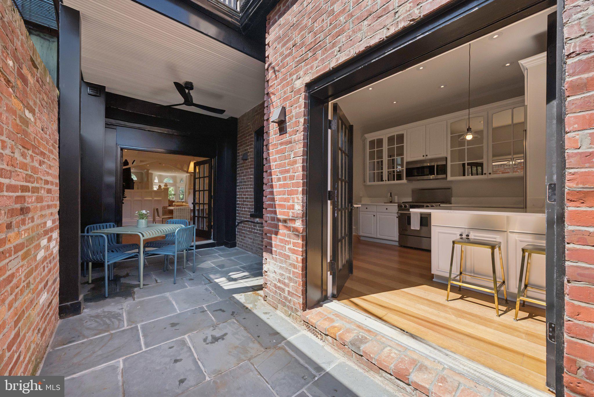 1849 Calvert Street Northwest Washington, DC 20009 - Photo 14 of 45 Rear patio located just off parking pad.