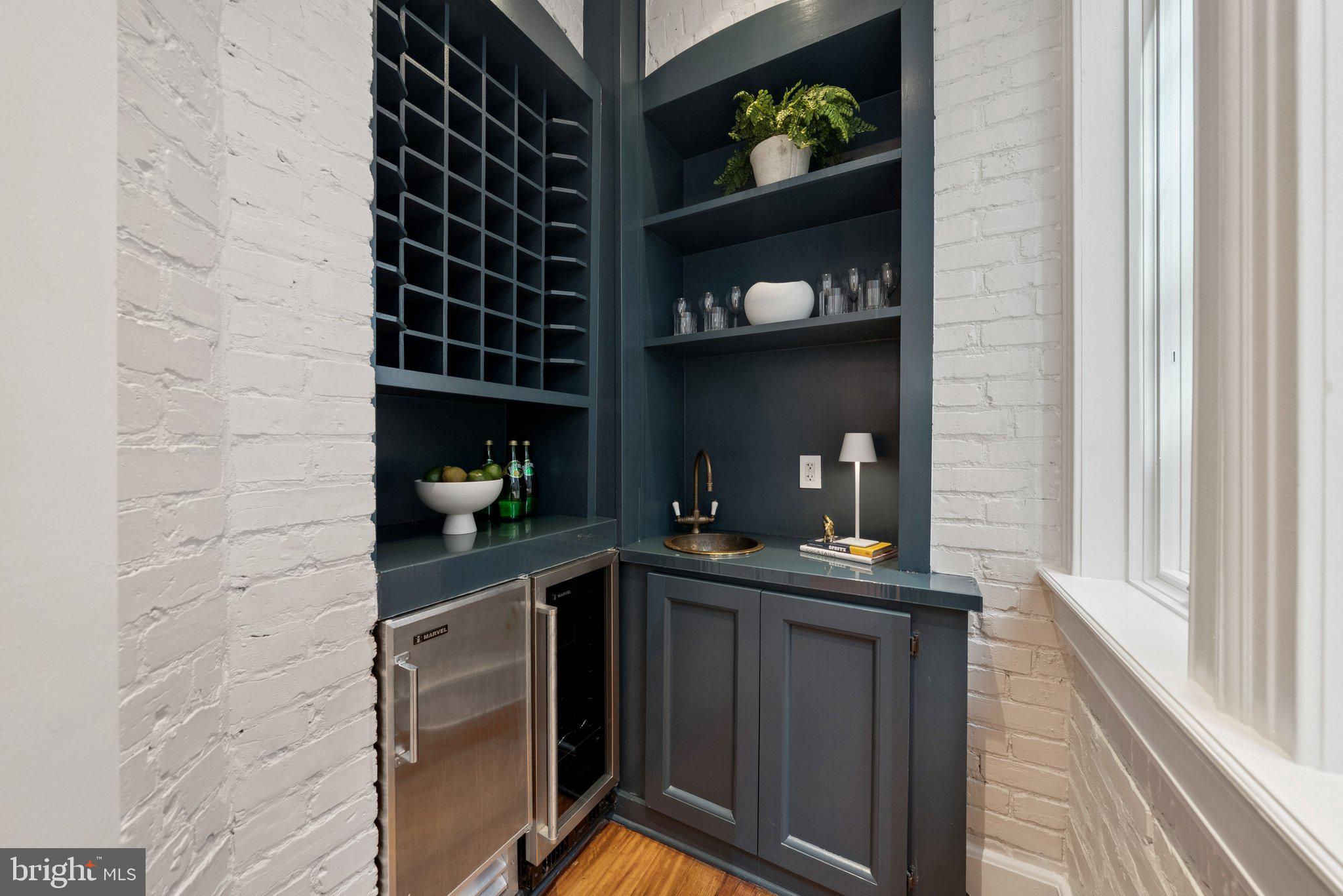 1849 Calvert Street Northwest Washington, DC 20009 - Photo 10 of 45 Butler's pantry with wine storage and ice maker.