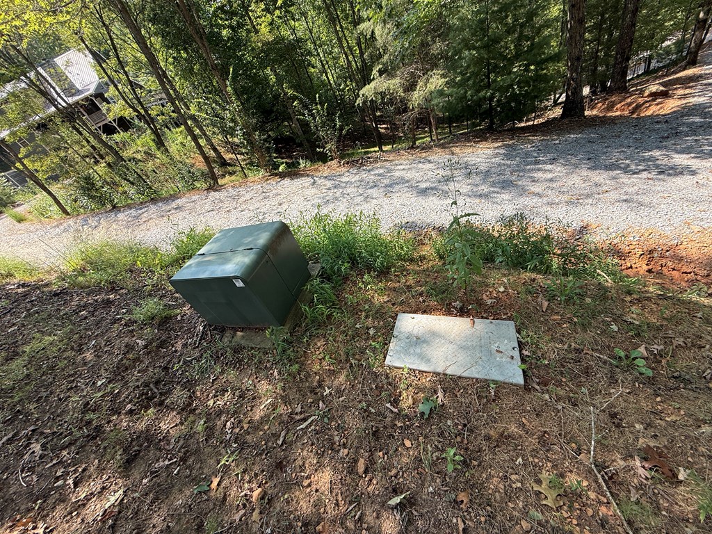 0 Madison Drive Murphy, NC 28906 - Photo 15 of 17 a backyard of a house with yard and outdoor seating