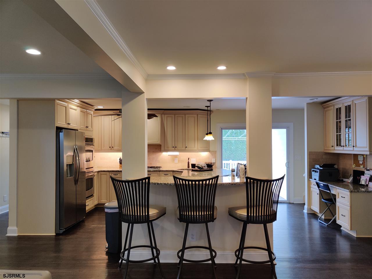 5806 Ventnor Avenue Ventnor City, NJ 08406 - Photo 5 of 25 a view of a dining room with furniture and wooden floor