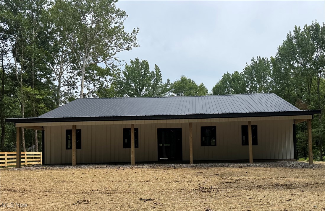 9945 Wesley Chapel Road Mount Perry, OH 43760 - Photo 5 of 15 View of front of property featuring a metal roof