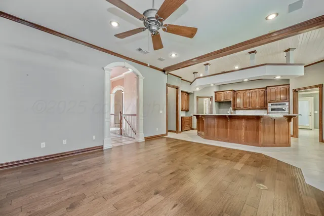 a view of a livingroom with a kitchen