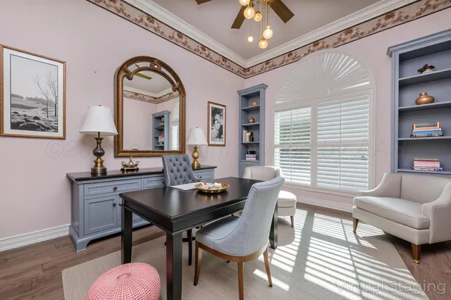 a workspace with furniture and window