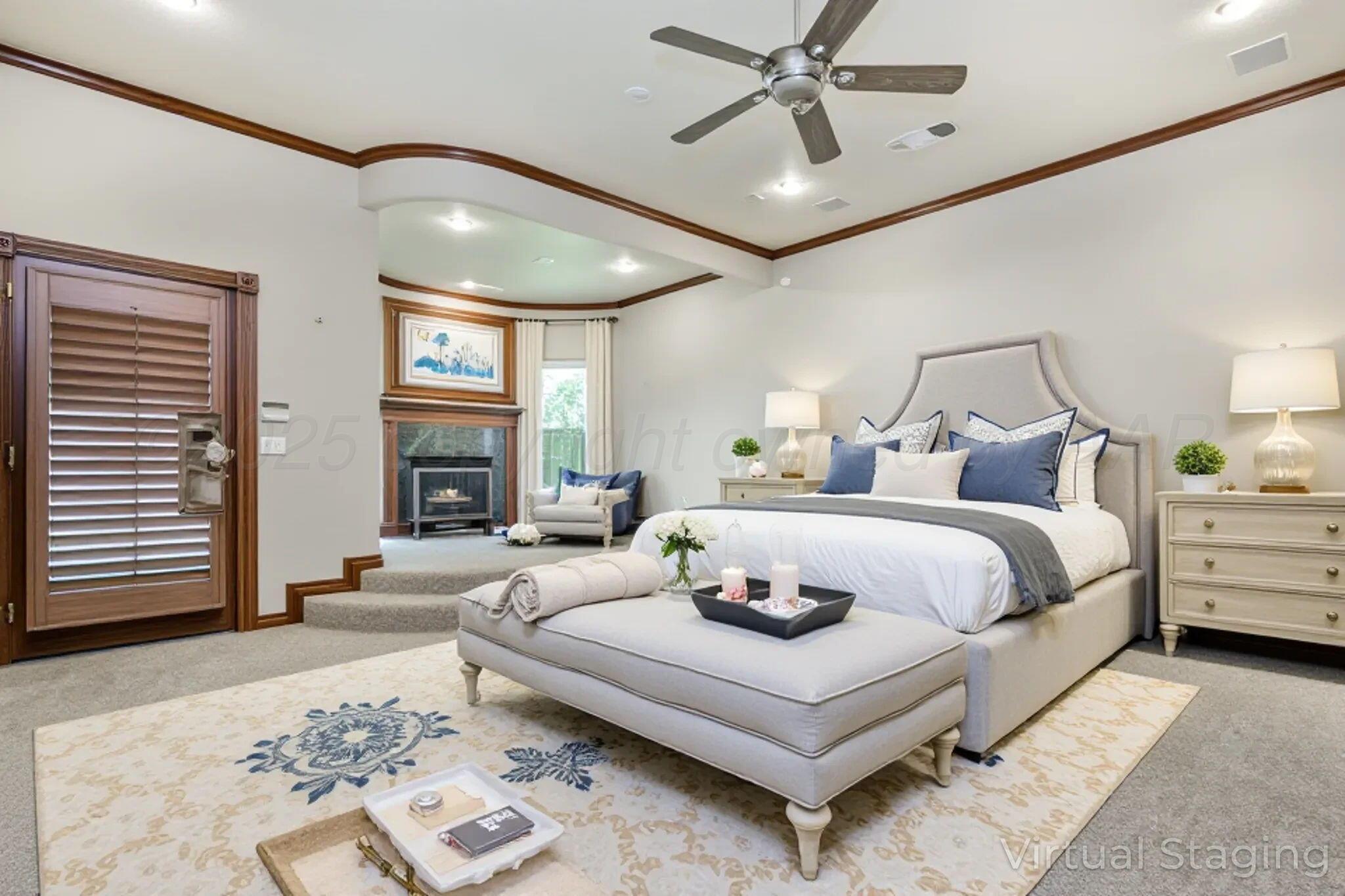 7408 Park Ridge Drive Amarillo, TX 79119 - Photo 23 of 51 a bedroom with a bed a ceiling fan and a rug