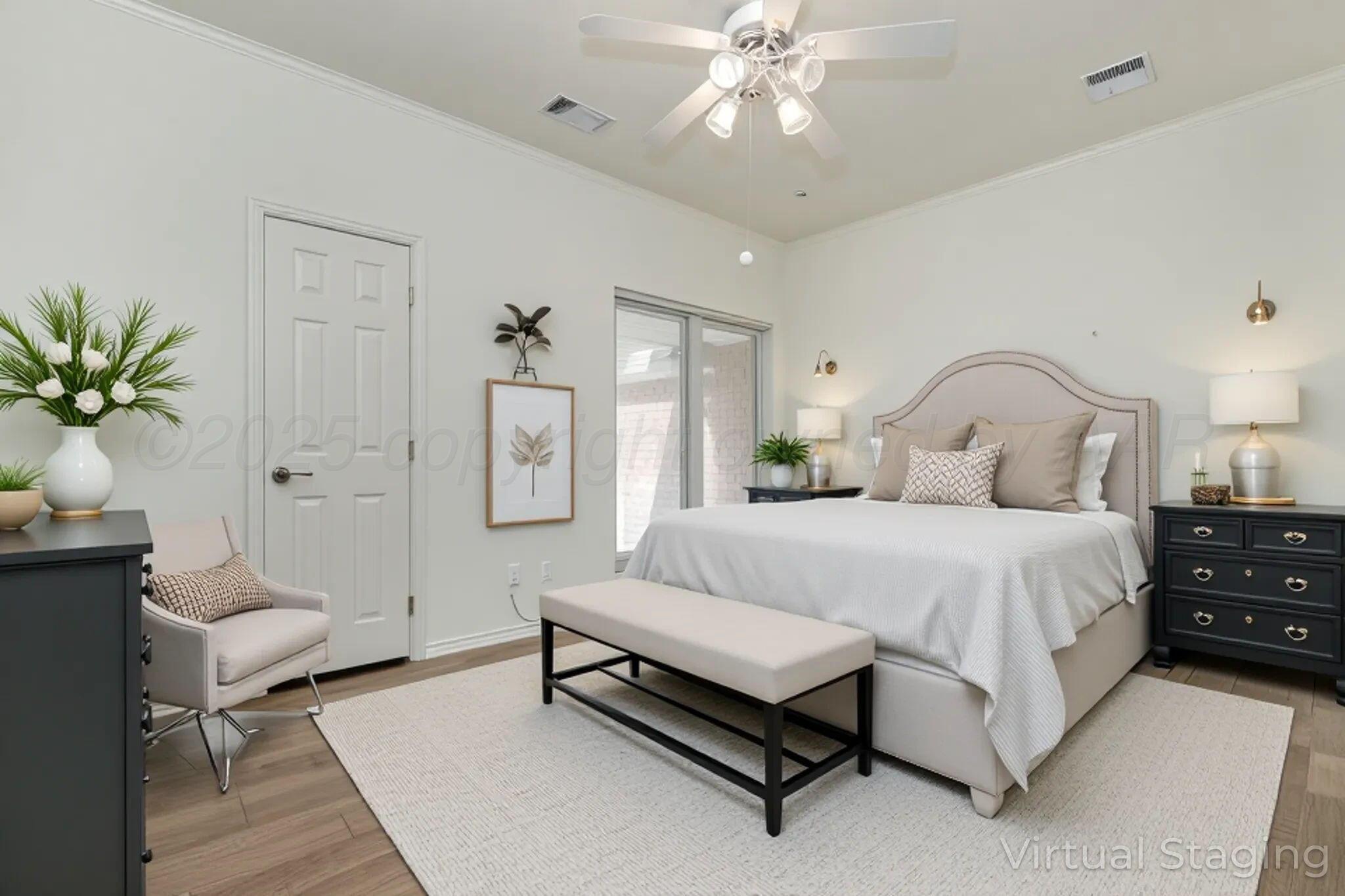 7408 Park Ridge Drive Amarillo, TX 79119 - Photo 33 of 51 a bedroom with a bed and a chandelier