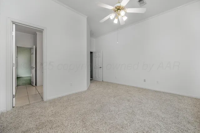 an empty room with a bathroom