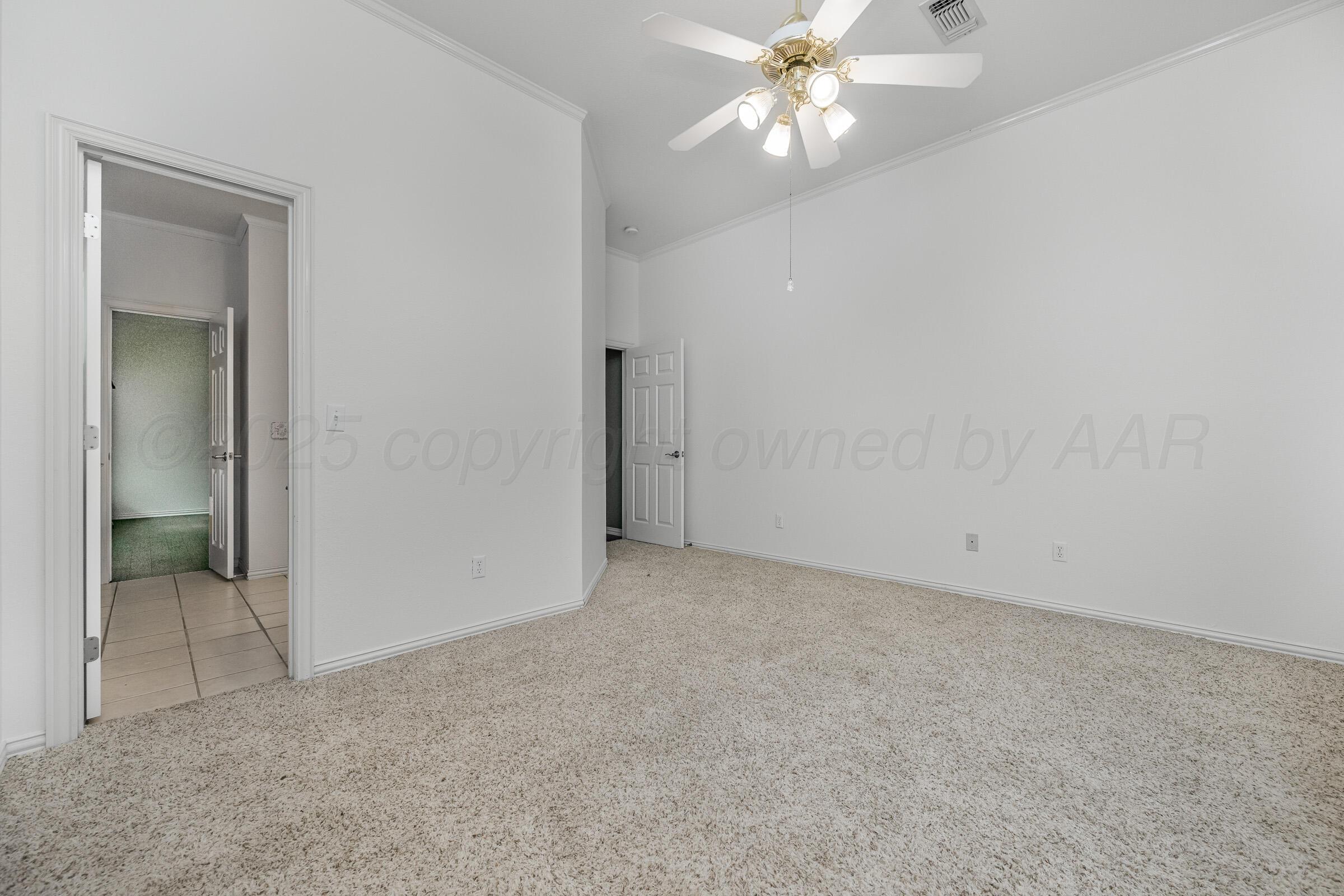 7408 Park Ridge Drive Amarillo, TX 79119 - Photo 37 of 51 an empty room with a bathroom