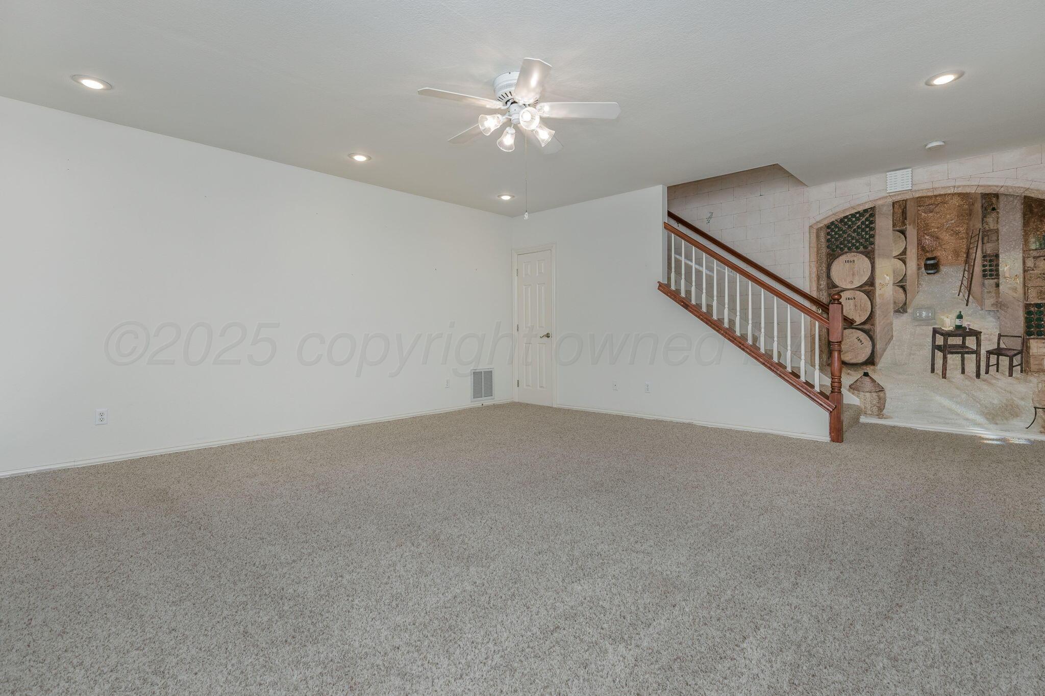 7408 Park Ridge Drive Amarillo, TX 79119 - Photo 39 of 51 a view of an empty room with a window