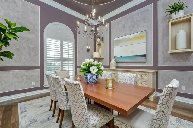 a dining room with furniture and window