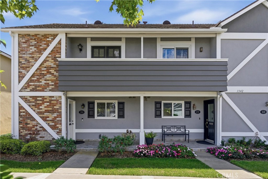 a front view of house with a yard
