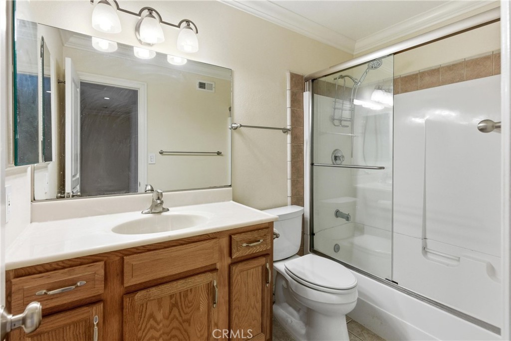 3342 Bradbury Road, Unit 20 Los Alamitos, CA 90720 - Photo 21 of 32 a bathroom with a sink toilet and shower