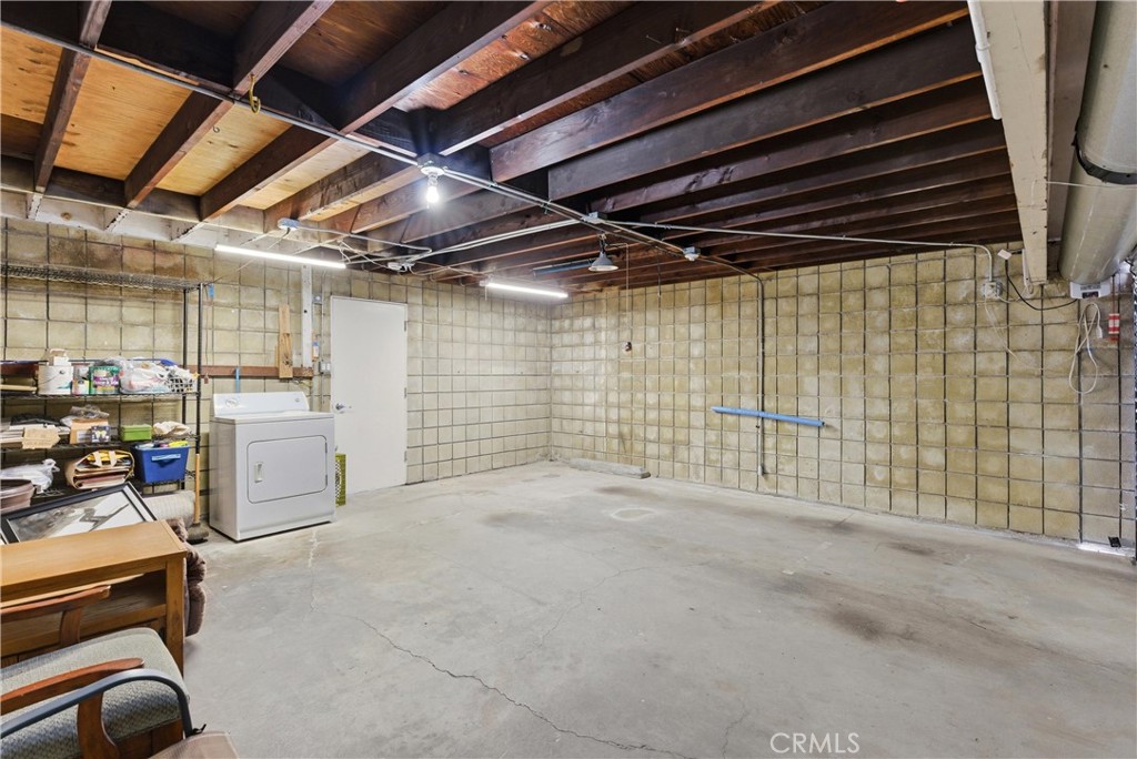 3342 Bradbury Road, Unit 20 Los Alamitos, CA 90720 - Photo 28 of 32 a view of empty room with wooden ceiling