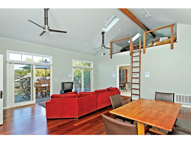 587 Patrol Road Woodside, CA 94062 - Photo 3 of 6 a room with furniture and wooden floor