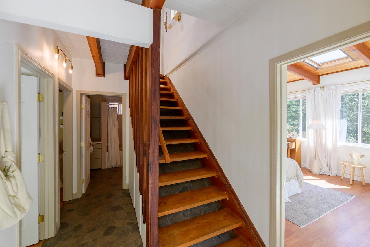 10735 Westwood Road Felton, CA 95018 - Photo 21 of 118 a view of a hallway with wooden floor and entryway
