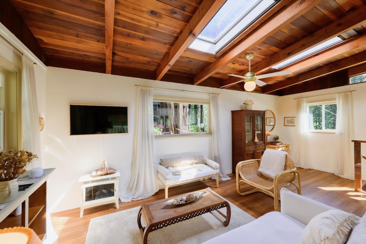 10735 Westwood Road Felton, CA 95018 - Photo 3 of 118 a living room with furniture and a flat screen tv
