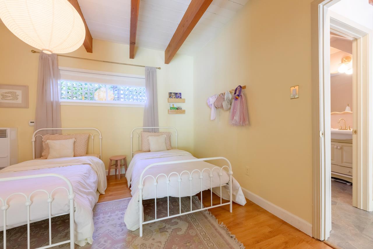 10735 Westwood Road Felton, CA 95018 - Photo 38 of 118 a bedroom with two beds and a table