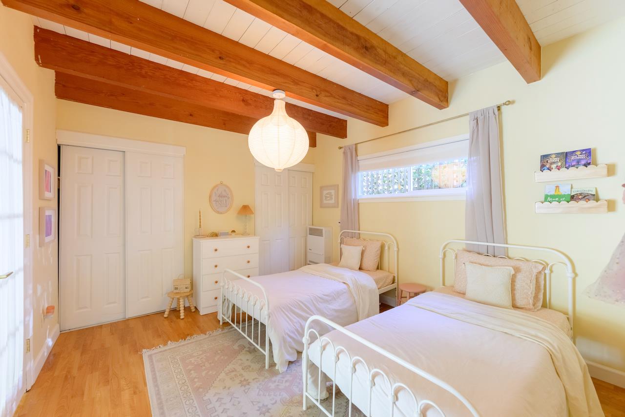 10735 Westwood Road Felton, CA 95018 - Photo 39 of 118 a bedroom with two beds and painting on the wall