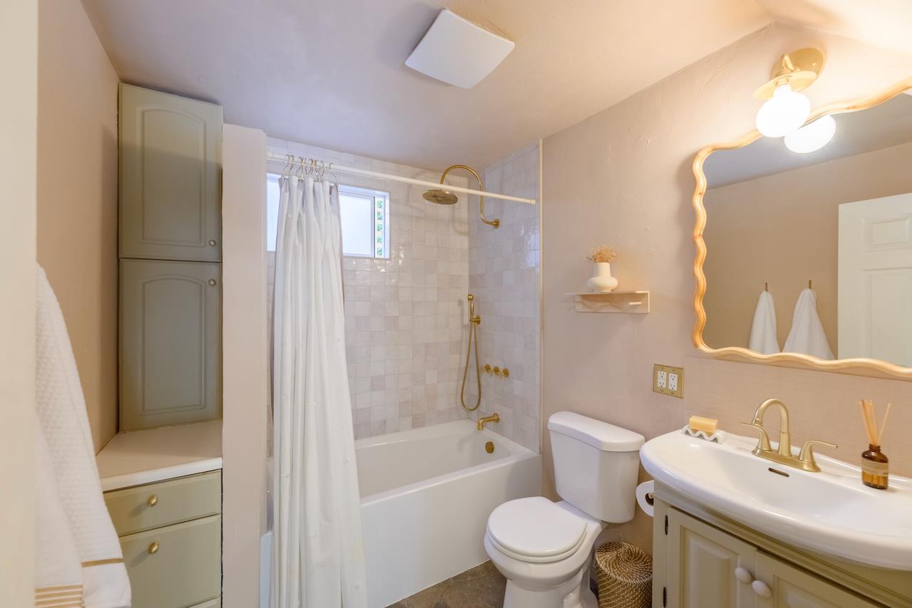 10735 Westwood Road Felton, CA 95018 - Photo 40 of 118 a bathroom with a sink toilet and shower