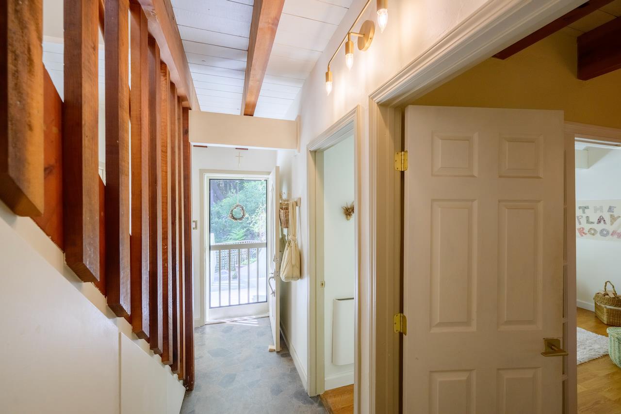 10735 Westwood Road Felton, CA 95018 - Photo 45 of 118 a view of a hallway with wooden door and entryway