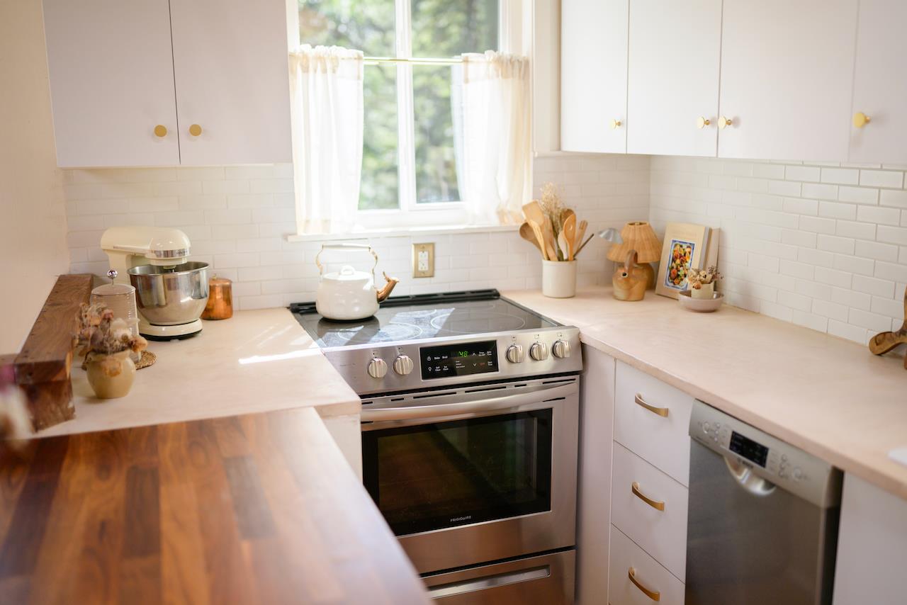 10735 Westwood Road Felton, CA 95018 - Photo 55 of 118 a kitchen with a sink a stove and cabinets