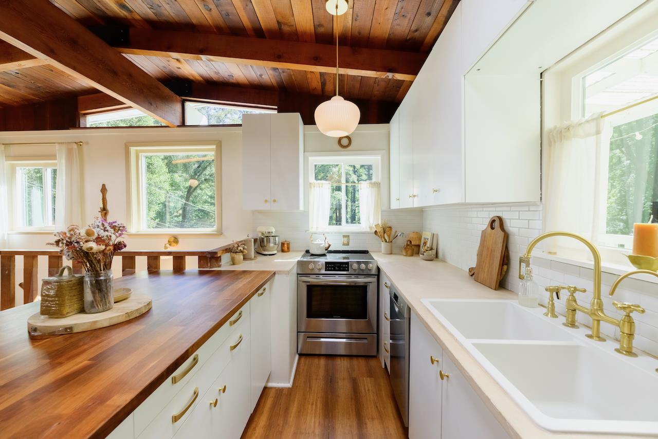 10735 Westwood Road Felton, CA 95018 - Photo 65 of 118 a kitchen with stainless steel appliances granite countertop a sink stove and cabinets