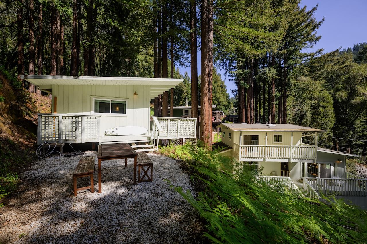 10735 Westwood Road Felton, CA 95018 - Photo 7 of 118 a view of a patio with table and chairs with wooden fence and plants