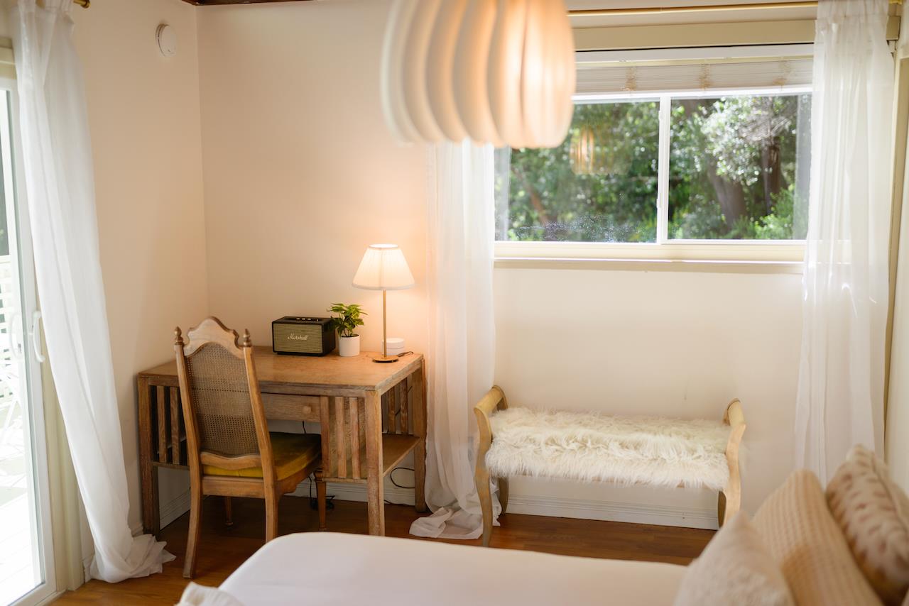 10735 Westwood Road Felton, CA 95018 - Photo 95 of 118 a bedroom with a bed and a table