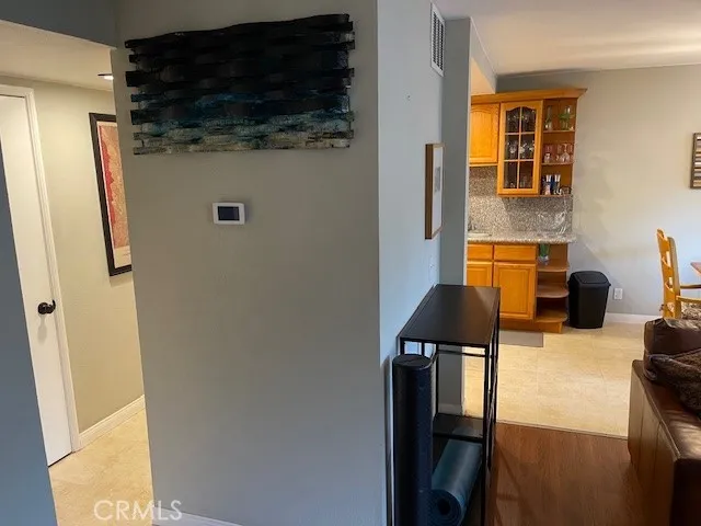 a kitchen with stainless steel appliances a refrigerator and a stove top oven