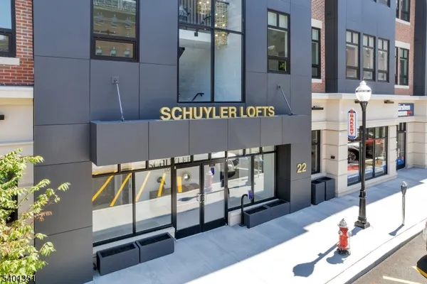 a view of a building with a street