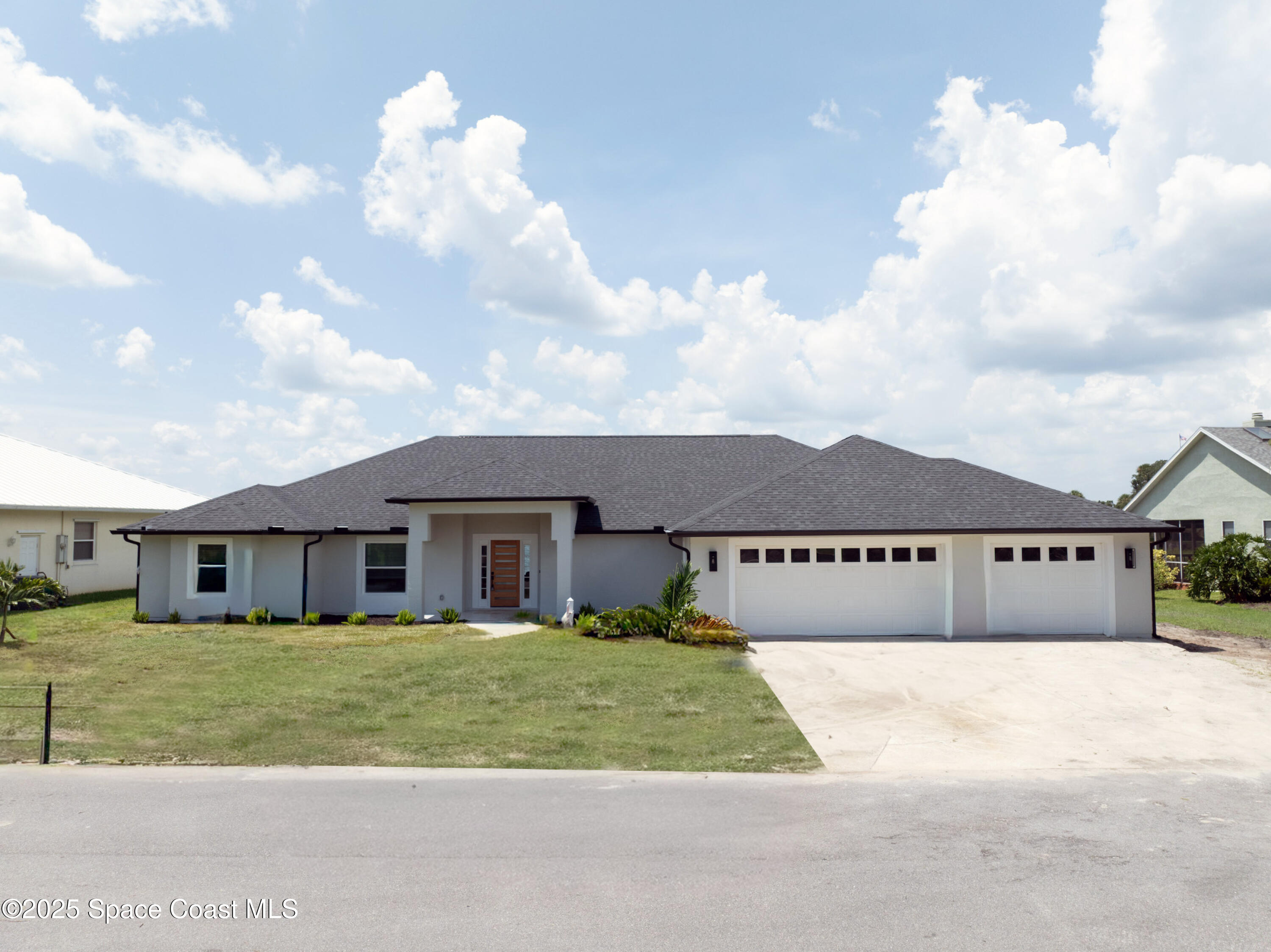855 Cliftons Cove Court Cocoa, FL 32926 - Photo 13 of 72 a view of house with outdoor space