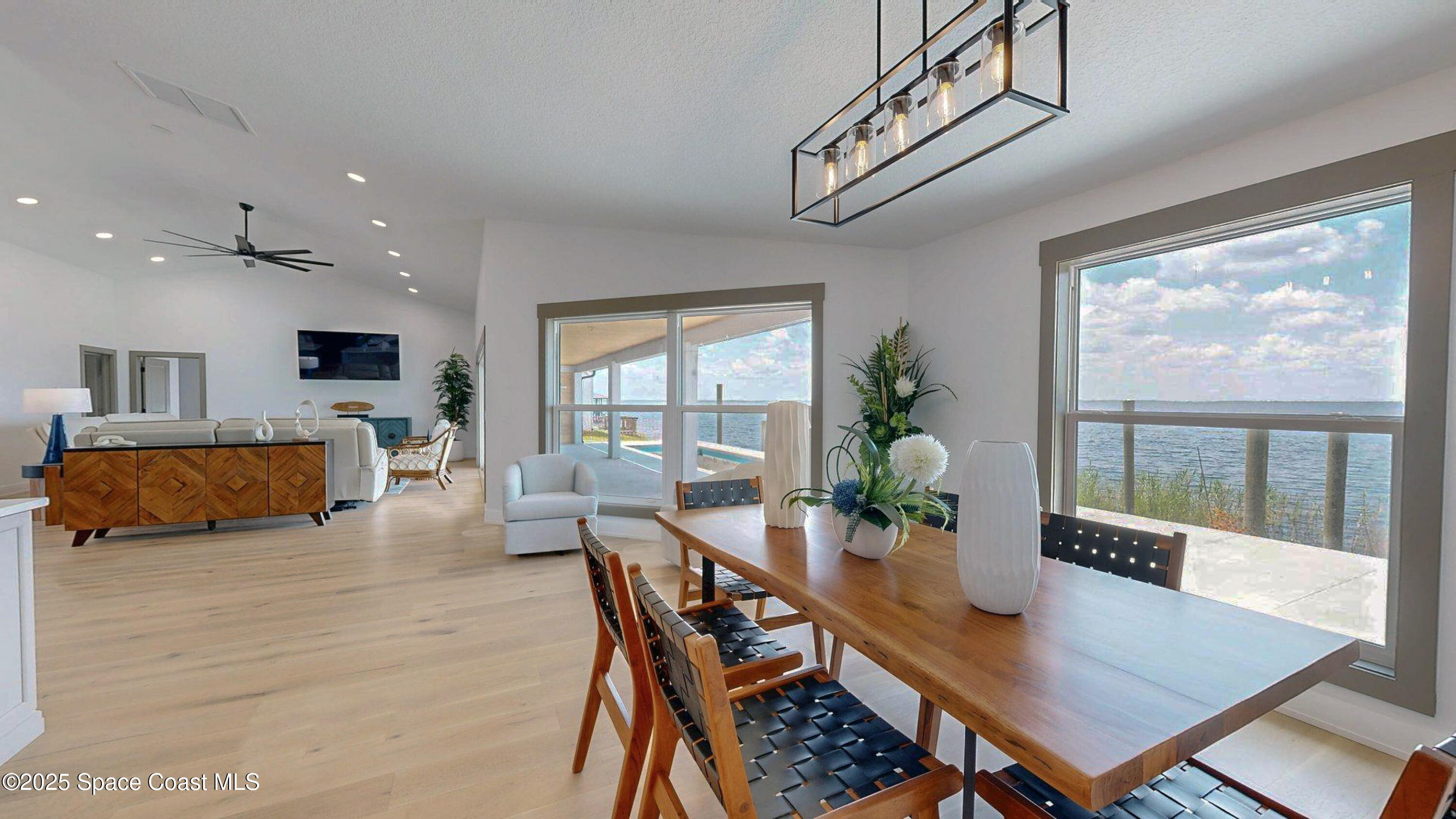 855 Cliftons Cove Court Cocoa, FL 32926 - Photo 29 of 72 a view of a dining room with furniture window and wooden floor