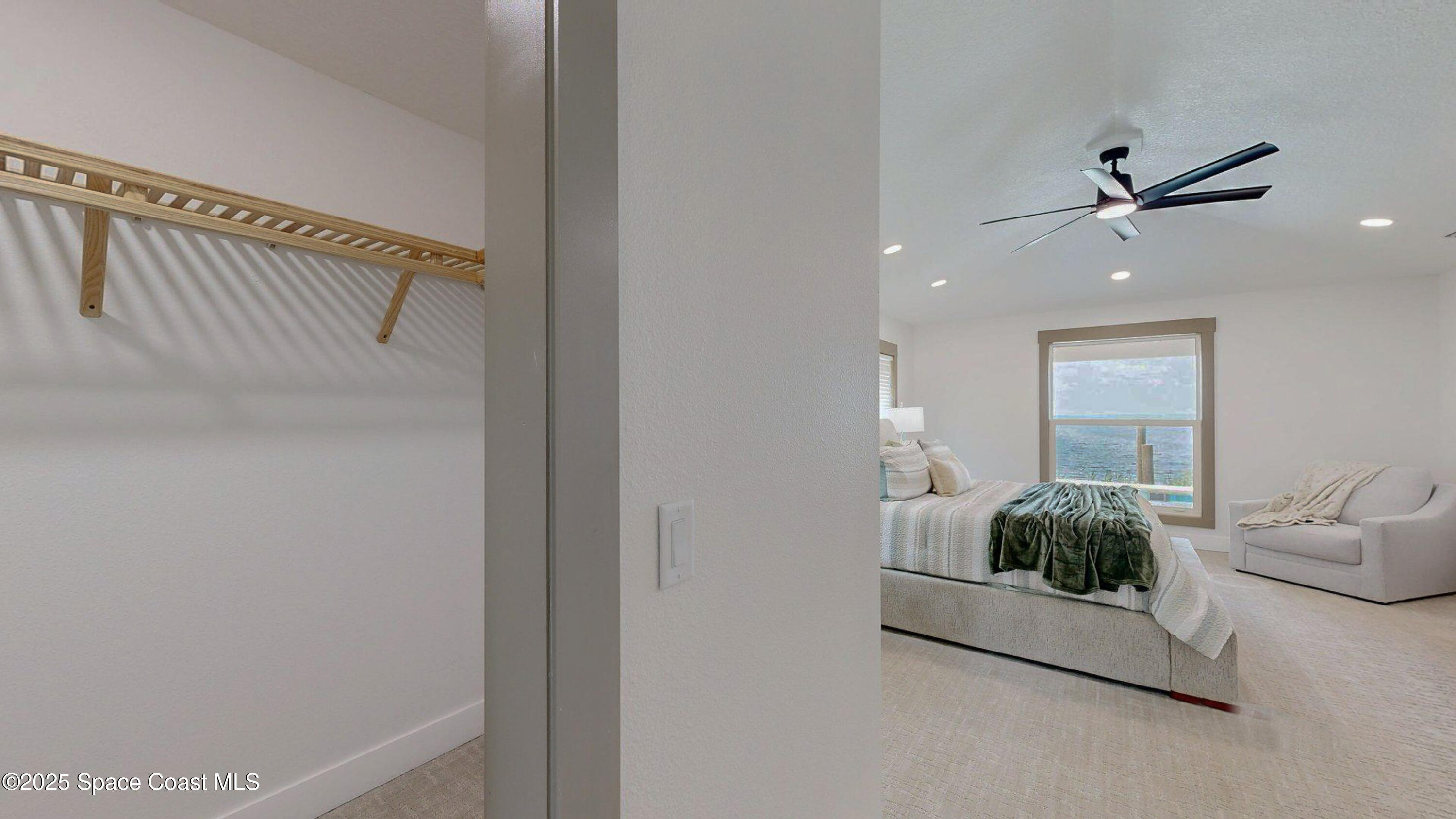 855 Cliftons Cove Court Cocoa, FL 32926 - Photo 52 of 72 a bedroom with a bed and a potted plant
