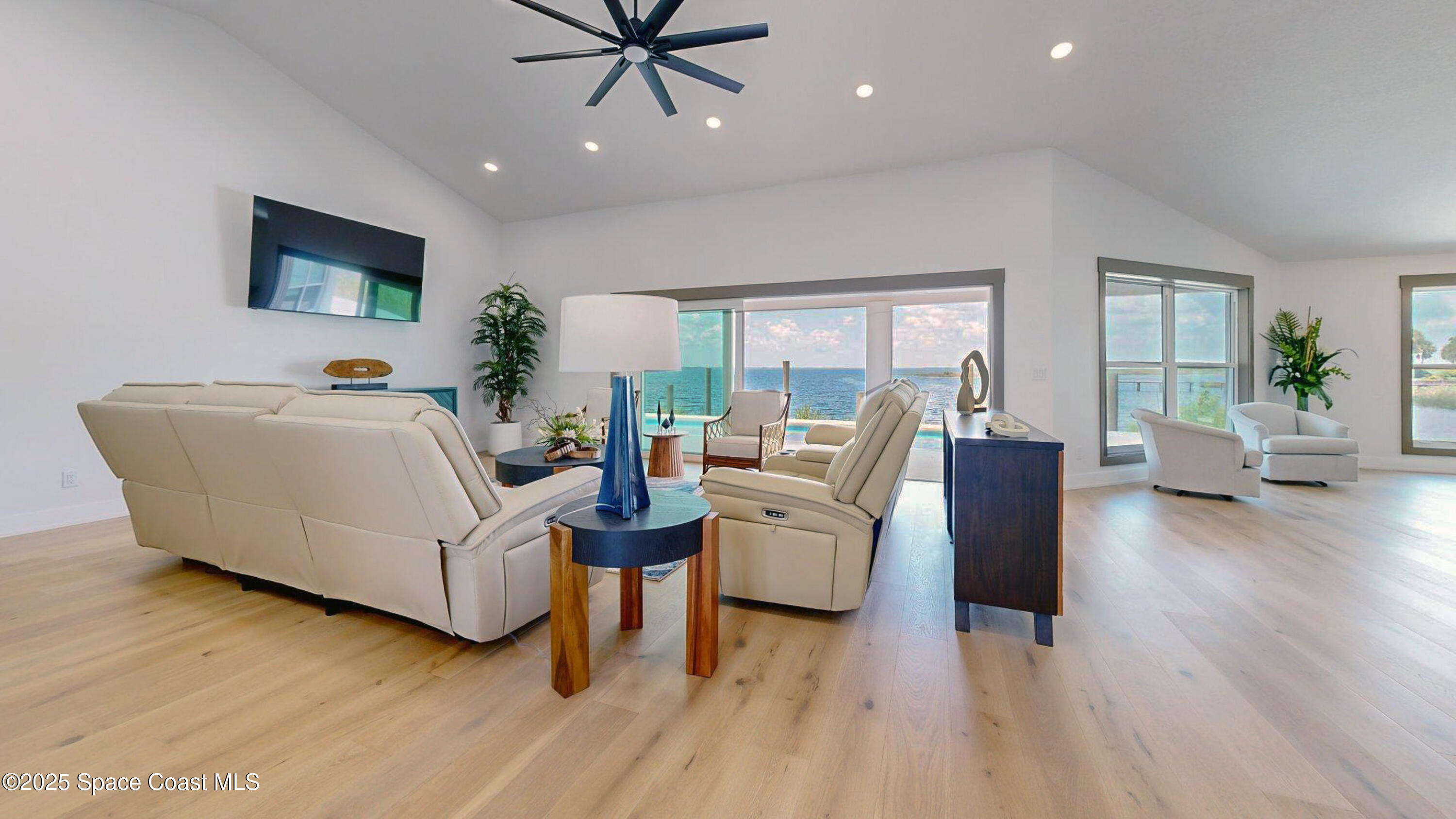 855 Cliftons Cove Court Cocoa, FL 32926 - Photo 71 of 72 a living room with furniture and a wooden floor