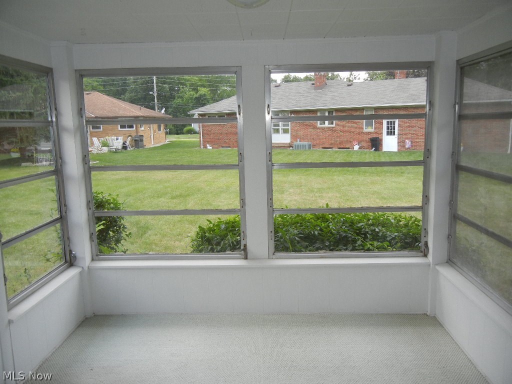 7436 Midland Road Independence, OH 44131 - Photo 7 of 22 lead to the sunroom...