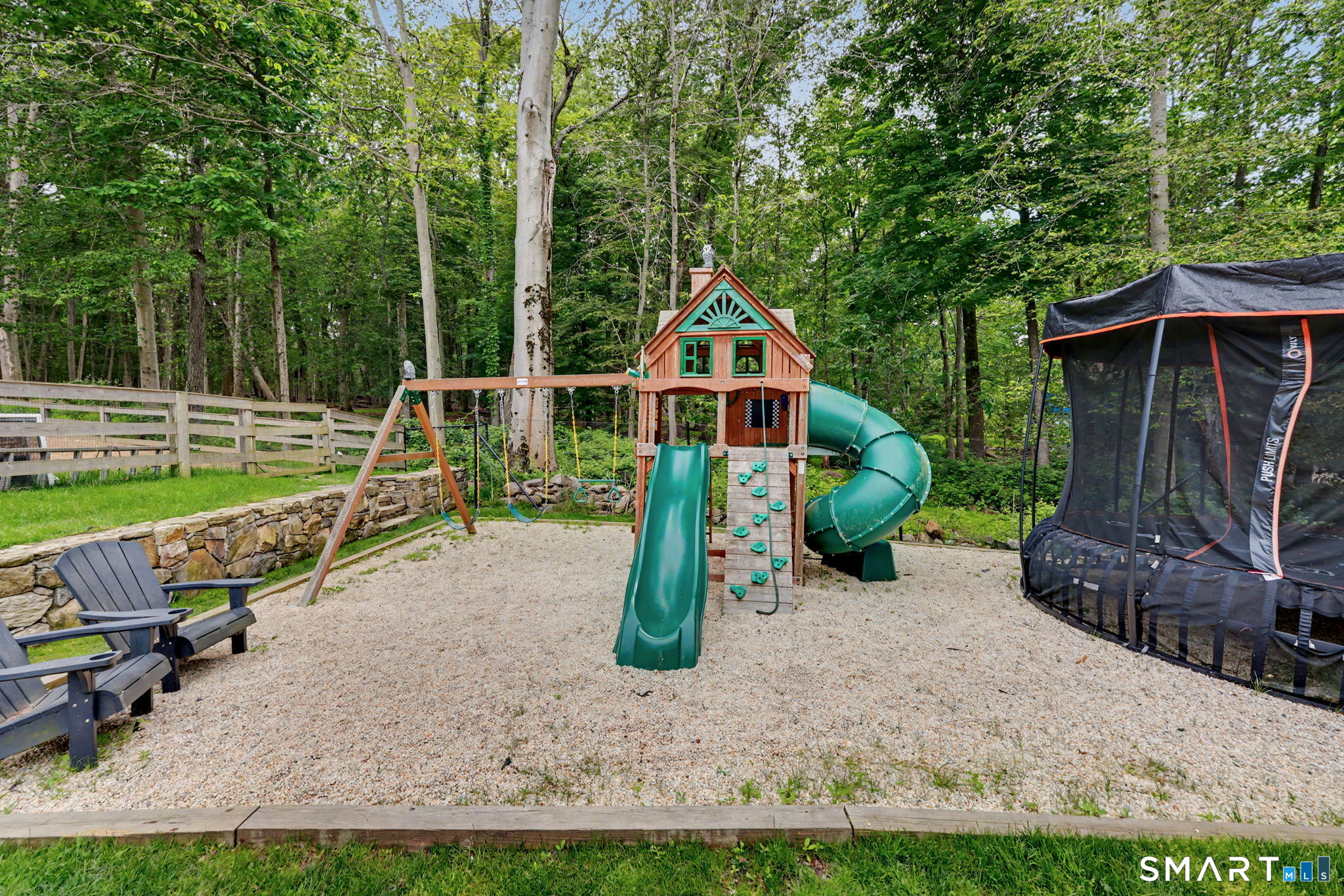 10 Side Hill Road Westport, CT 06880 - Photo 39 of 40 a childrens park with lots of swings and slides