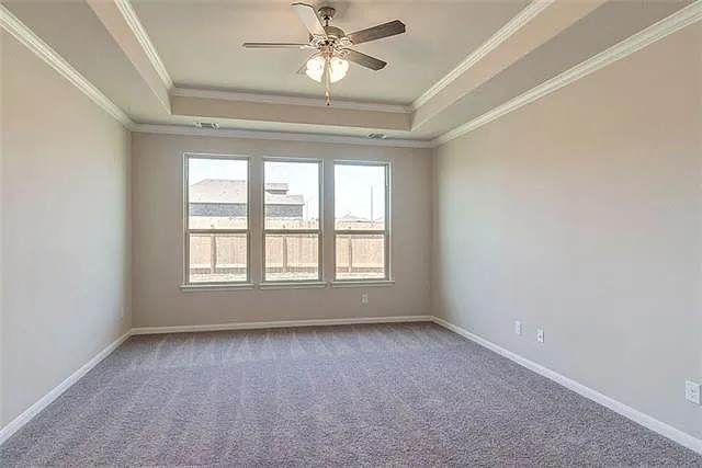 20008 Navarre Terrace Pflugerville, TX 78660 - Photo 10 of 18 an empty room with a window and a fan