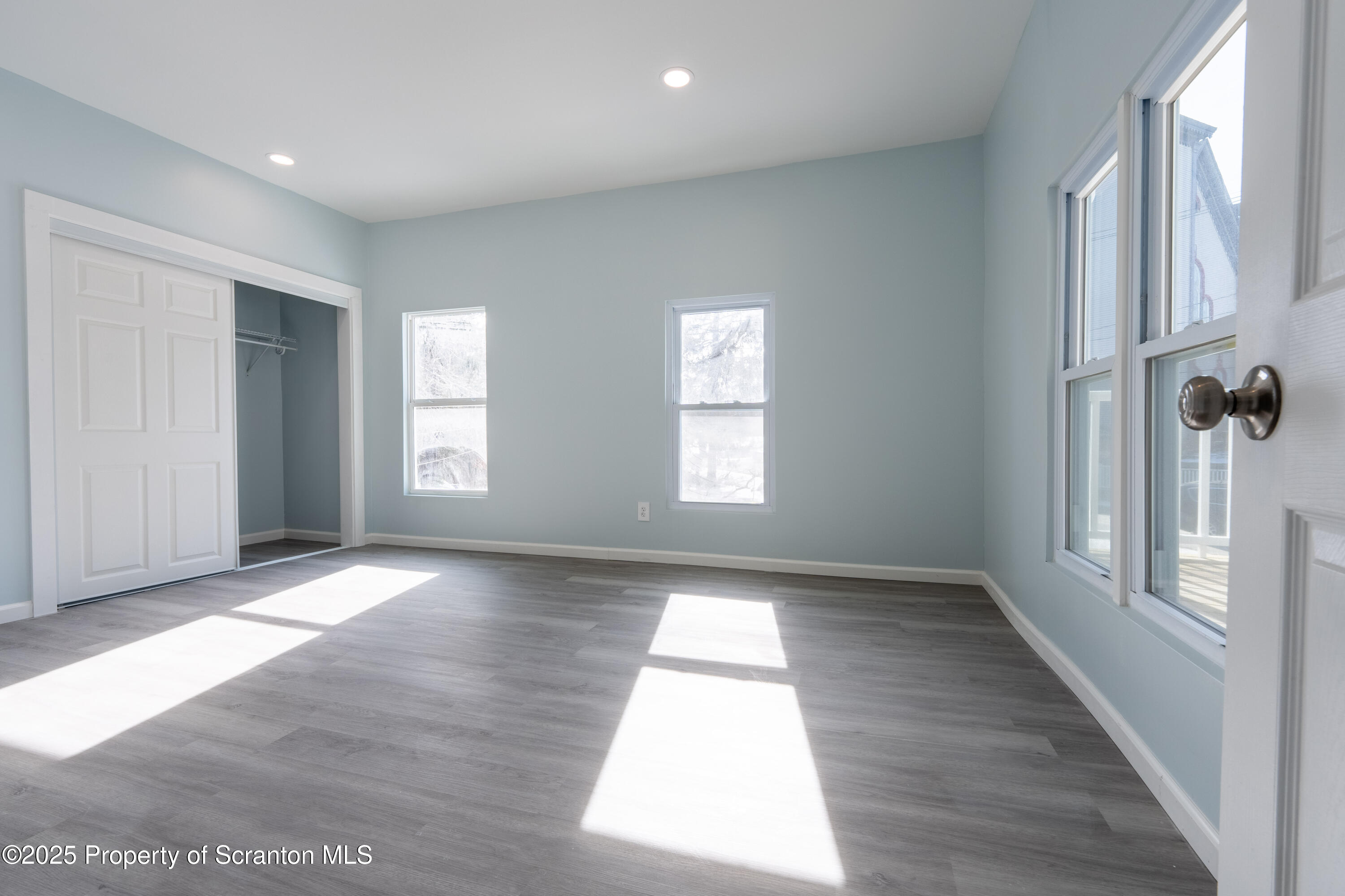 12 Grow Avenue Montrose, PA 18801 - Photo 1 of 88 an empty room with wooden floor and windows