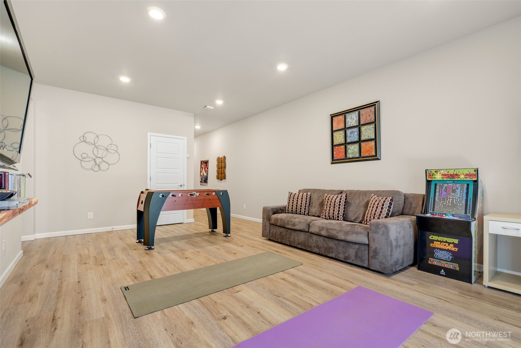 216 178th Street Southeast Bothell, WA 98012 - Photo 35 of 40 a living room with furniture and a wooden floor