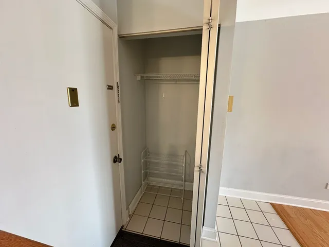 a bathroom with a glass door shower