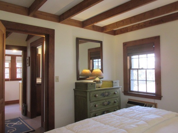 3 Brooks Road Rockport, MA 01966 - Photo 16 of 26 a bedroom with a dresser and a mirror